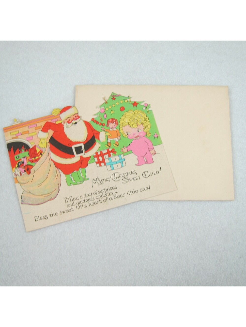 Vintage Christmas Card & Envelope Kewpie Style Girl & Santa Toys Tree Fireplace